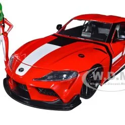 2020 Toyota Supra Red With Graphics And Miriya Sterling Diecast Figurine "Robotech" "Hollywood Rides" Series 1/24 Diecast Model Car By Jada